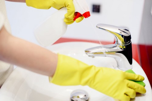 Team performing office cleaning in W14